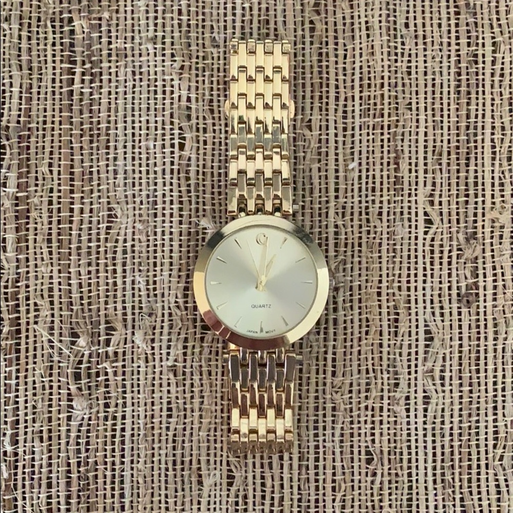 Stainless steel gold tone watch